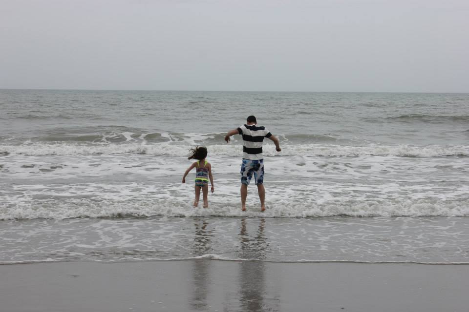 People playing in the ocean at Myrtle Beach.