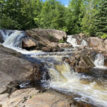 Ultimate Guide To Visiting Waterfalls In Marquette Michigan yellow dog waterfall