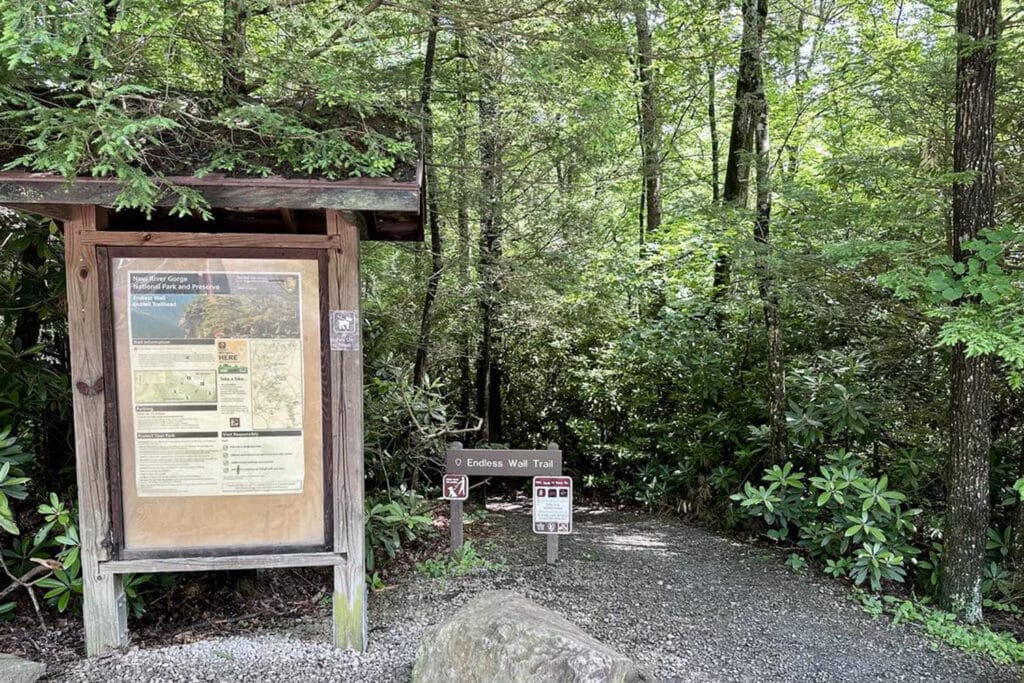 Nuttall Trailhead sign at the Endless Wall Hike, marking the starting point surrounded by trees and a well-maintained path.